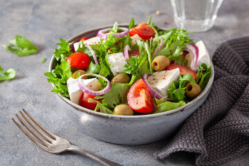 tomato salad with brie cheese olives onion lettuce