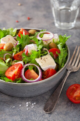 tomato salad with brie cheese olives onion lettuce