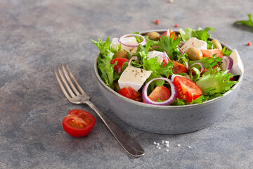 tomato salad with brie cheese olives onion lettuce