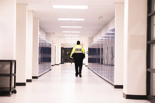 Security guard patrolling at school