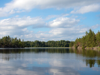 Fototapeta na wymiar landscape on a forest lake