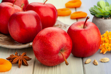 red apples on wood background
