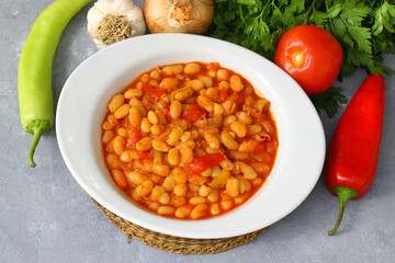 Traditional delicious Turkish foods; Dried bean (Kuru fasulye). Hot turkish bean stew with a tasty tomato sauce. Haricot. 