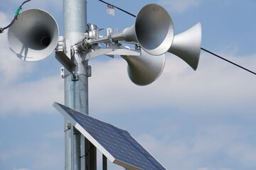 outdoor public address system consisting of five amplification megaphones