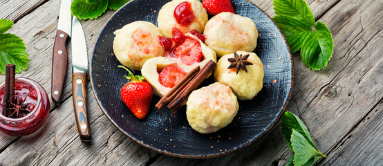Dumplings or knedliky with strawberries filling