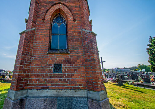 General view and close-up of architectural details of a cemetery chapel built in the second half of the 19th century in Czerwin, Mazovia, Poland.