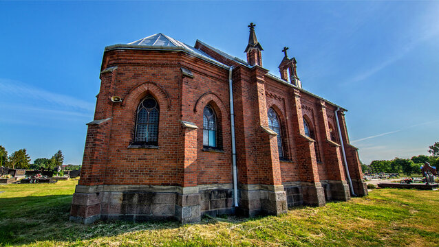 General view and close-up of architectural details of a cemetery chapel built in the second half of the 19th century in Czerwin, Mazovia, Poland.