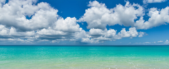Stunning beautiful sea landscape beach with turquoise water. Beautiful Sand beach with turquoise water. Beautiful tropical beach with blue sky and white clouds.