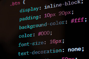 HTML website source code on the screen.