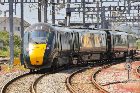 Cardiff, Wales - June 2023: High speed train operated by Great Western Railway leaving Cardiff Central railway station