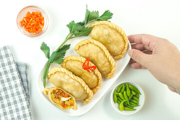 Fried pastels, in Indonesia known as Pastel goreng