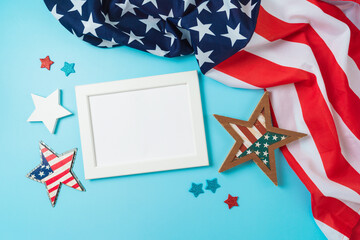 Obraz na płótnie Canvas Happy Independence Day, 4th of July celebration concept with frame mock up, stars and USA flag on blue background. Top view, flat lay