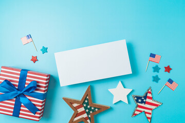 Happy Independence Day, 4th of July celebration concept with greeting card mock up, stars and USA flag on blue background. Top view, flat lay