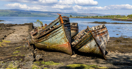 Salen's 3 ships - iconic boat wrecks on the shore line on the Isle of Mull