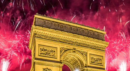 Celebratory colorful fireworks over the Arc de Triomphe, Paris, France