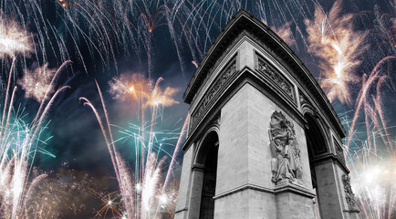 Celebratory colorful fireworks over the Arc de Triomphe, Paris, France