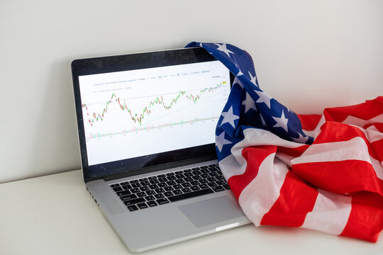 Investor watching the change of stock market on tablet. - Powered by Adobe