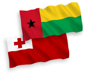 Flags of Kingdom of Tonga and Republic of Guinea Bissau on a white background