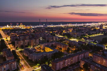 Fototapeta na wymiar Scenic aerial view of the Old town of Klaipeda, Lithuania in purple evening light. Klaipeda city port area and it's surroundings.