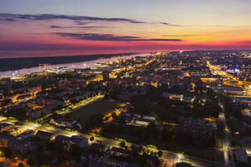 Fototapeta premium Scenic aerial view of the Old town of Klaipeda, Lithuania in purple evening light. Klaipeda city port area and it's surroundings.