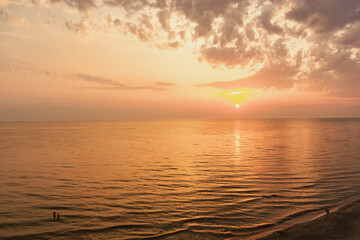 Aerial view of the Baltic Sea shore line near Klaipeda city, Lithuania. Beautiful sea coast on summer evening.
