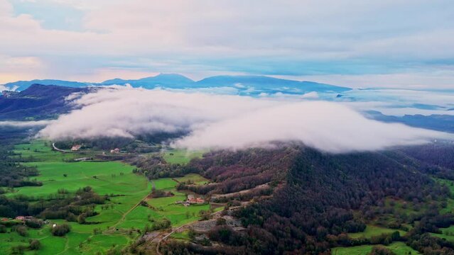 Moving clouds view from the top of mountain cliff edge