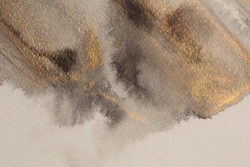 Beige, gold, brown ink and watercolor smoke flow stain blot on wet paper grain texture background
