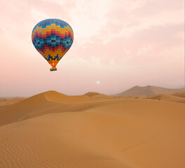 Fototapeta na wymiar Desert and hot air balloon Landscape at Sunrise. Travel, inspiration, success, dream, flight concept