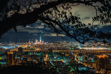 Fototapeta premium Night scenery of the Taipei city lights, evening time, seeing from top of the mountain. 