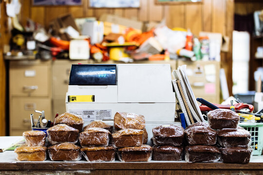 Homemade muffins and a cash register at a country hardware store