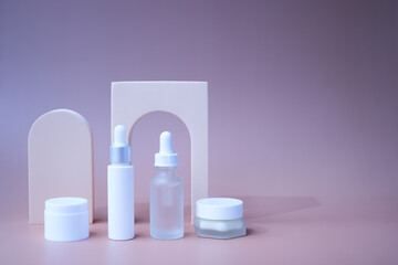 Beauty products on a beauty purple background. clean cosmetic and spa concepts.