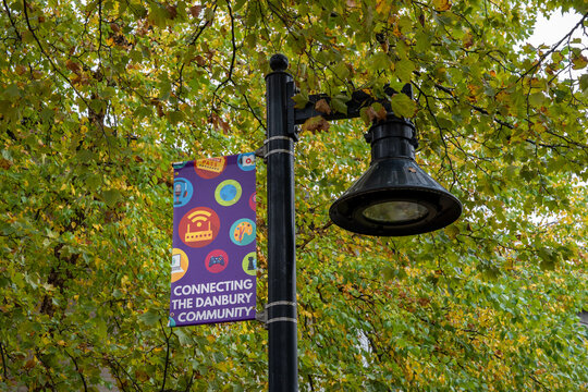 Danbury, CT - Oct. 17, 2022: Connecting the Danbury Community banner on a lamp post.