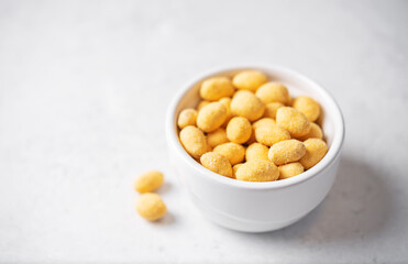 Cheese peanuts in a bowl