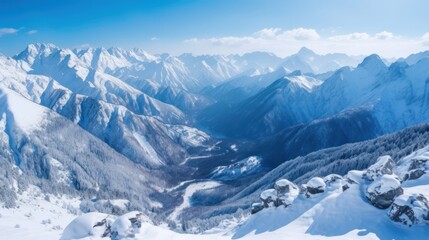 Obraz premium Serene mountain range covered in snow, with a breathtaking view of the valley below