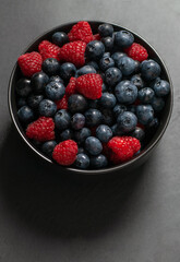 Blueberry Raspberry mixed on dark background 