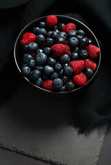 Blueberry Raspberry mixed on dark background 