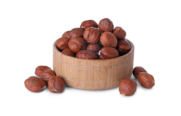 Bowl of delicious hazel nuts isolated on white