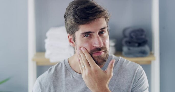 Face cream, skincare and man in a bathroom for beauty, cosmetics and treatment application. Portrait, facial and male with sunscreen, moisturizer or dermatology, lotion and skin wellness routine