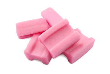 Many tasty pink chewing gums on white background