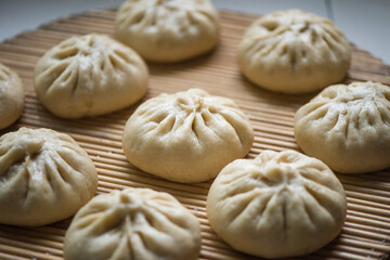 Homemade steamed stuffed buns. Delicious baozi,
