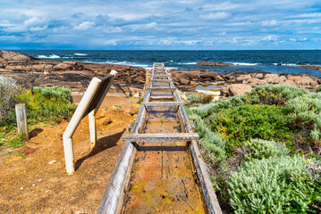 Cape Leeuwin water wheel, sometimes called the petrified water wheel, is a non-operating water...