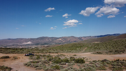 OHV area just outside the city limits of Reno Nevada. Truck parked with bike ramp down
