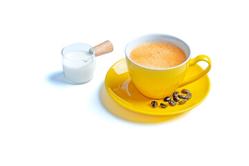 Yellow coffee cup and fresh milk cup on a white background