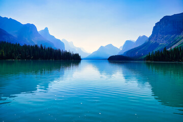 Calm waters of Lake Maligne near Jasper in the Canada Rockies