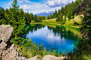 Fototapeta na wymiar Picturesque View of one of the lakes in the Valley of Five Lakes Region near Jasper in the Canada Rockies