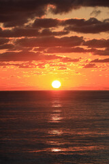 Fototapeta na wymiar Sunset over the water