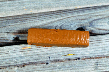 Chocolate caramel bar, a delicious fusion of crunchy peanuts, sweet caramel, and a creamy center...