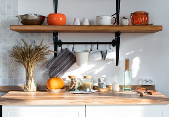 Kitchen Interior Design - Wooden Furniture and White Wall, Utensils on the Shelves
