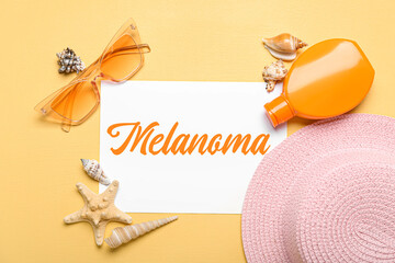 Banner with beach accessories and word MELANOMA