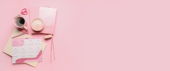 Calendar for 2024 year with alarm clock, cup of coffee and office stationery on pink background...